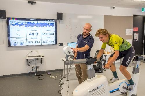 04-01-23_Dr_Ryan_Worn_Federation_University_with_cyclist.jpg - Federation shares Sport Science expertise with cycling community